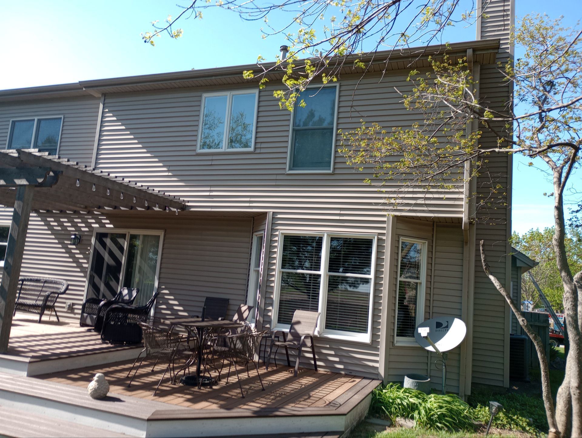 Clean home exterior and concrete after service